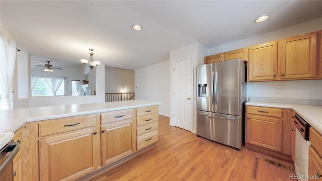 kitchen featuring stainless steel fridge with ice dispenser, light countertops, light wood-style flooring, range, and dishwasher