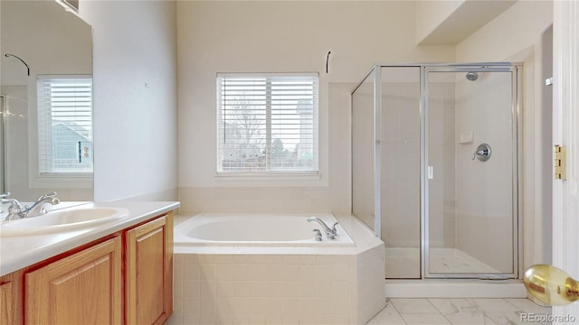 full bathroom with marble finish floor, vanity, a shower stall, and a bath