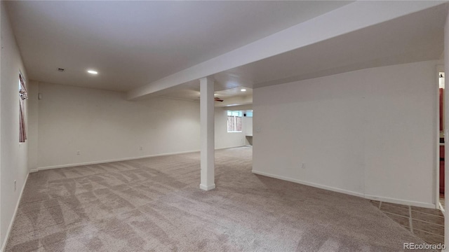 basement featuring baseboards, carpet flooring, and recessed lighting