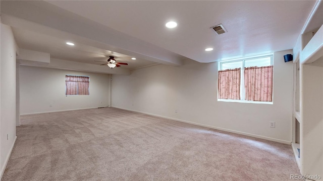 carpeted spare room with recessed lighting, visible vents, ceiling fan, and baseboards