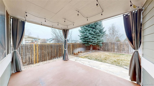 view of patio with a fenced backyard