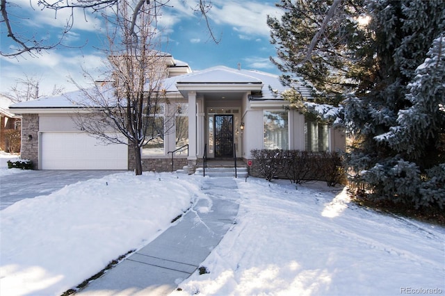 view of front of property with a garage