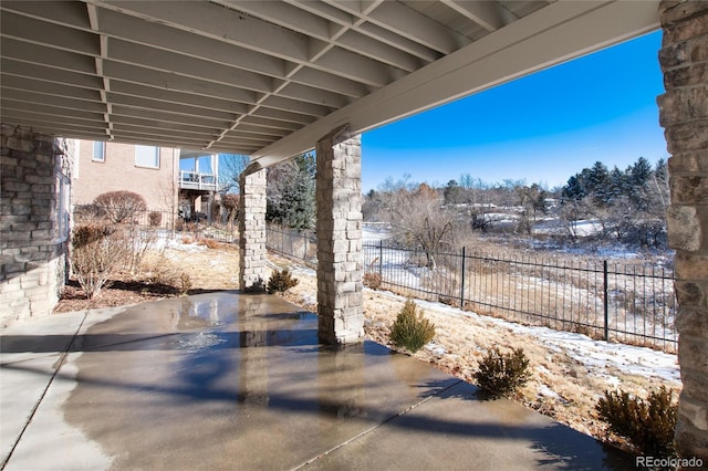 view of snow covered patio