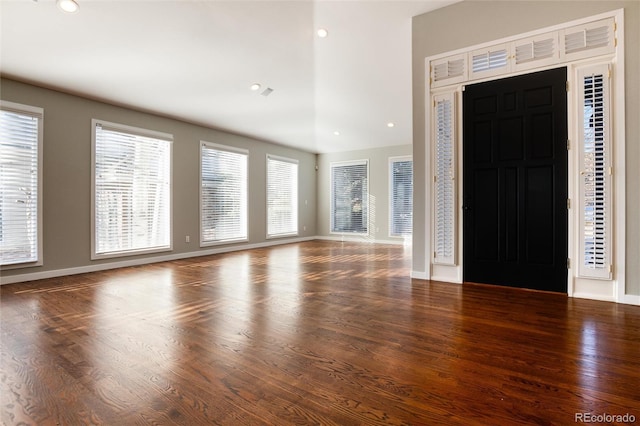 foyer entrance featuring dark hardwood / wood-style floors