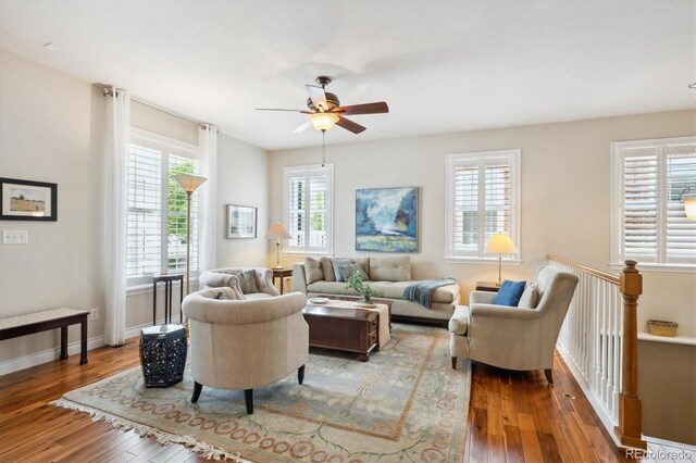 2723 Galena St, Denver, CO 80238 - living room featuring wood-type flooring, ceiling fan, and baseboards