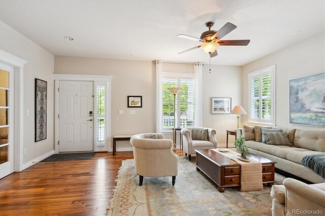 2723 Galena St, Denver, CO 80238 - living room with hardwood / wood-style flooring, plenty of natural light, a ceiling fan, and baseboards