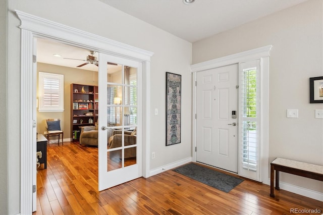 2723 Galena St, Denver, CO 80238 - entrance foyer featuring wood-type flooring, healthy amount of natural light, baseboards, and ceiling fan