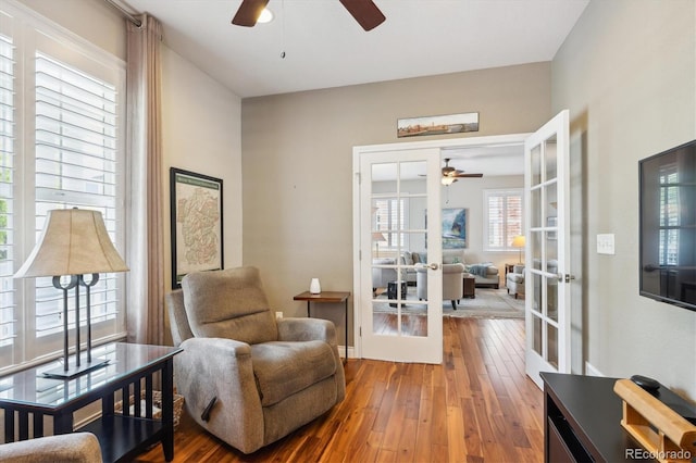 2723 Galena St, Denver, CO 80238 - living area with ceiling fan, french doors, and wood-type flooring