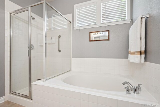 2723 Galena St, Denver, CO 80238 - full bath with a bath and a stall shower