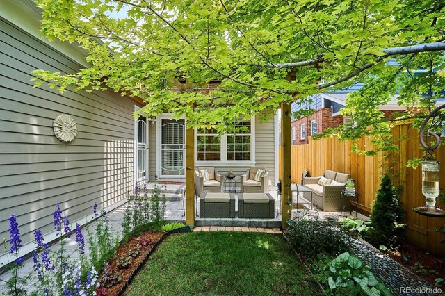 2723 Galena St, Denver, CO 80238 - view of yard with an outdoor living space and a patio area