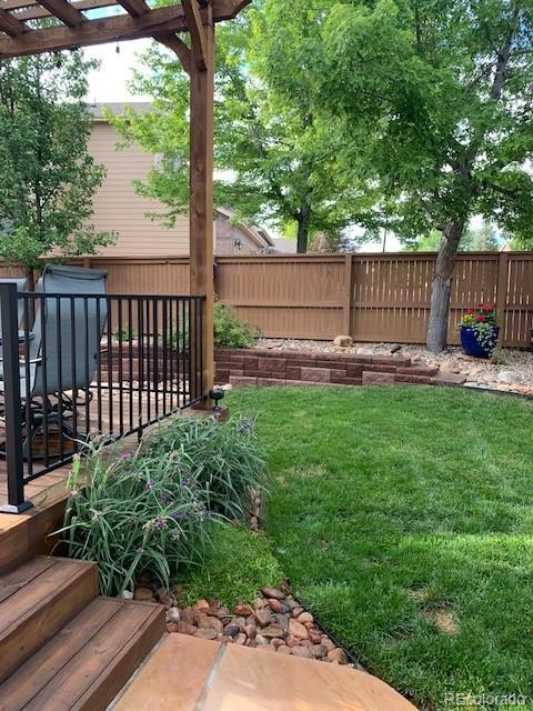 view of yard with a pergola