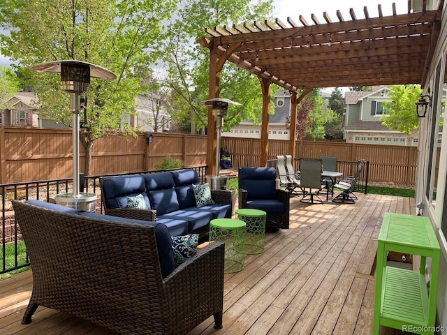 deck featuring an outdoor hangout area and a pergola