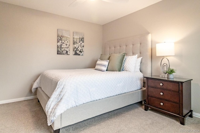 bedroom with light colored carpet