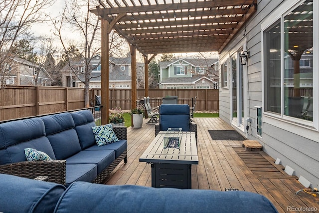 wooden terrace featuring an outdoor living space and a pergola