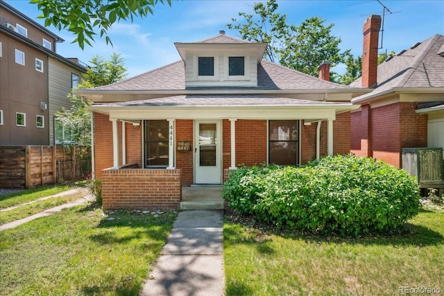 4461 Vrain St, Denver, CO 80212 - bungalow-style home with a shingled roof and brick siding