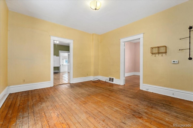 4461 Vrain St, Denver, CO 80212 - empty room featuring hardwood / wood-style floors and baseboards