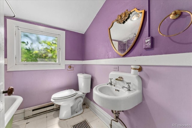 4461 Vrain St, Denver, CO 80212 - full bath featuring a baseboard heating unit, lofted ceiling, a tub to relax in, and tile patterned flooring