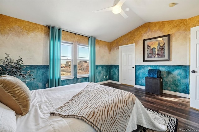 bedroom with vaulted ceiling, ceiling fan, and dark hardwood / wood-style flooring