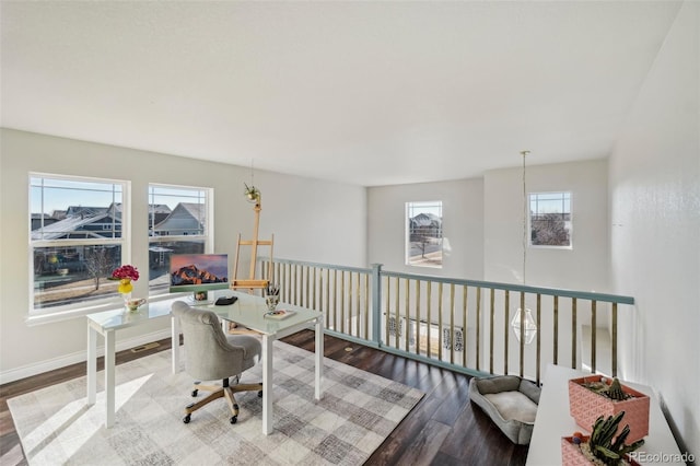 office area with hardwood / wood-style floors