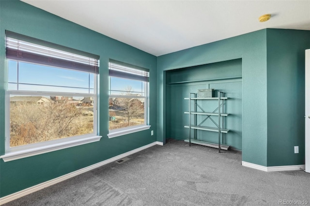 unfurnished bedroom featuring carpet floors