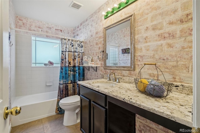 full bathroom featuring vanity, tile patterned flooring, shower / bath combination with curtain, and toilet