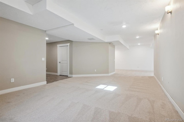 basement with light carpet