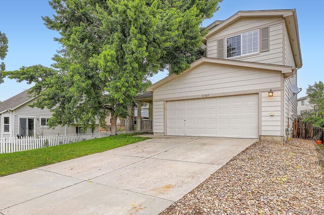 21767 Silver Meadow Ln, Parker, CO 80138 - view of front facade with driveway and a garage