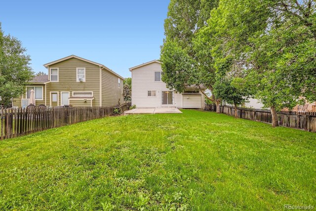 21767 Silver Meadow Ln, Parker, CO 80138 - fenced backyard featuring a patio area