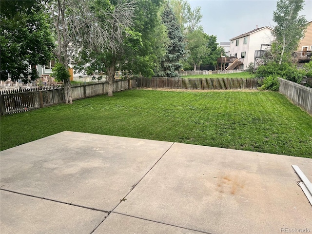 21767 Silver Meadow Ln, Parker, CO 80138 - fenced backyard with a patio area