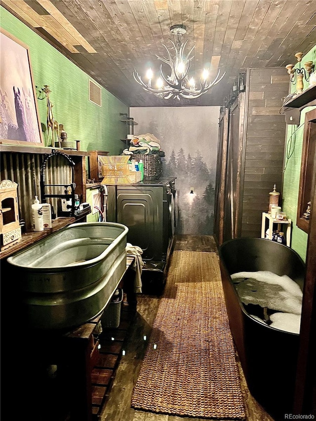 bathroom with a chandelier, hardwood / wood-style floors, and wooden ceiling