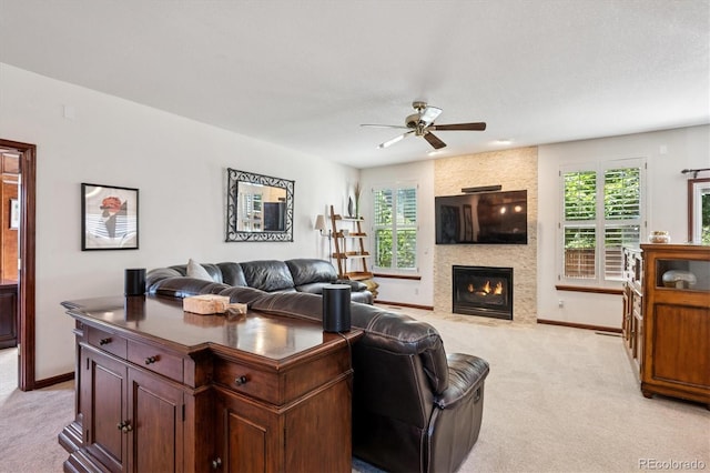 7804 Silverweed Way, Lone Tree, CO 80124 - living area with light colored carpet, a ceiling fan, baseboards, and healthy amount of natural light