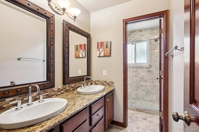 7804 Silverweed Way, Lone Tree, CO 80124 - bathroom with a stall shower, double vanity, tile patterned floors, and baseboards