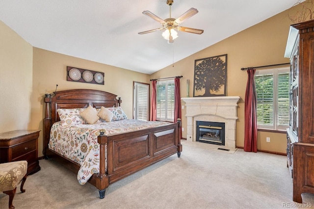 7804 Silverweed Way, Lone Tree, CO 80124 - carpeted bedroom with vaulted ceiling, a fireplace, baseboards, and ceiling fan