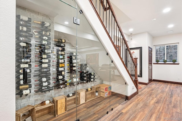 7804 Silverweed Way, Lone Tree, CO 80124 - wine room featuring baseboards, wood finished floors, and recessed lighting