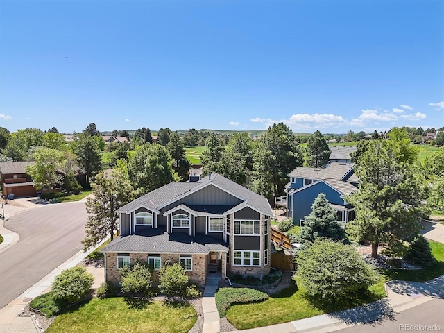 7804 Silverweed Way, Lone Tree, CO 80124 - view of front of home with board and batten siding and stone siding