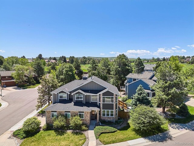 7804 Silverweed Way, Lone Tree, CO 80124 - view of front of property with board and batten siding and stone siding