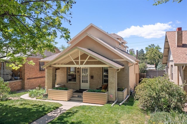 1121 S Ogden St, Denver, CO 80210 - back of property with brick siding
