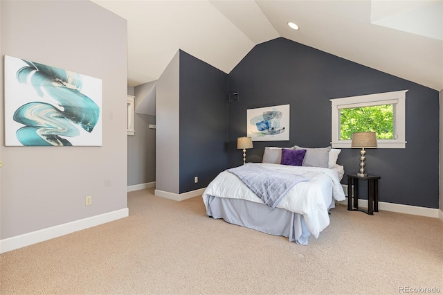 1121 S Ogden St, Denver, CO 80210 - carpeted bedroom featuring lofted ceiling and baseboards