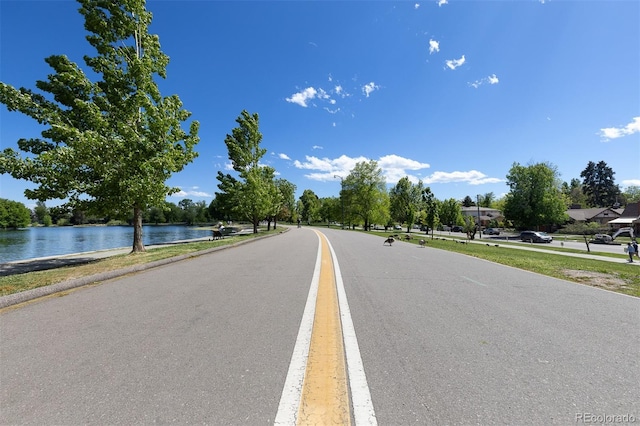 1121 S Ogden St, Denver, CO 80210 - view of asphalt street with a water view