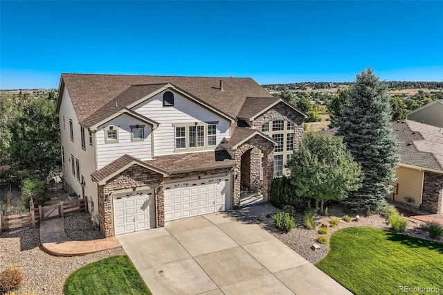 view of front of property featuring a garage