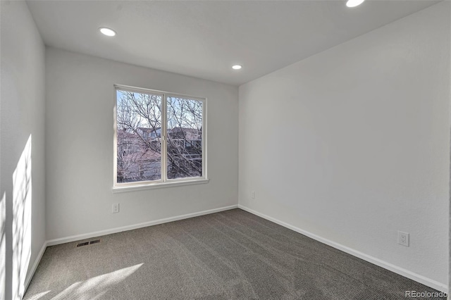 view of carpeted spare room