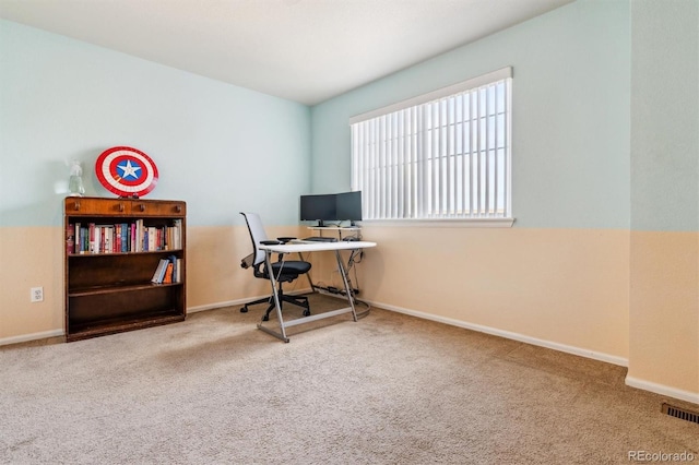 view of carpeted office space