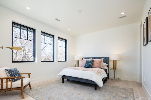 bedroom featuring light hardwood / wood-style flooring