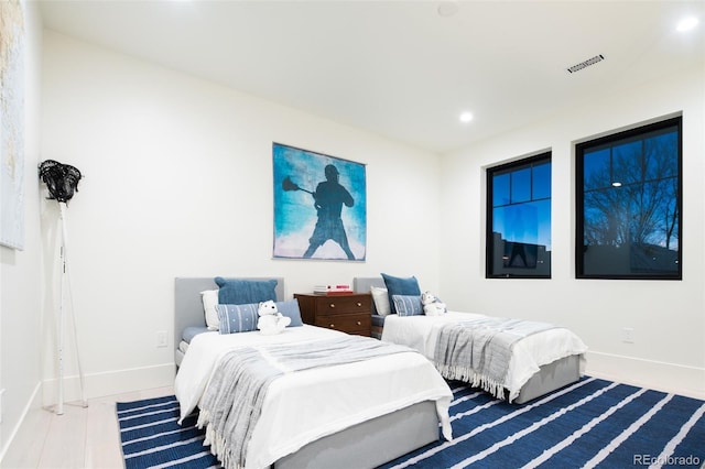 bedroom featuring wood-type flooring