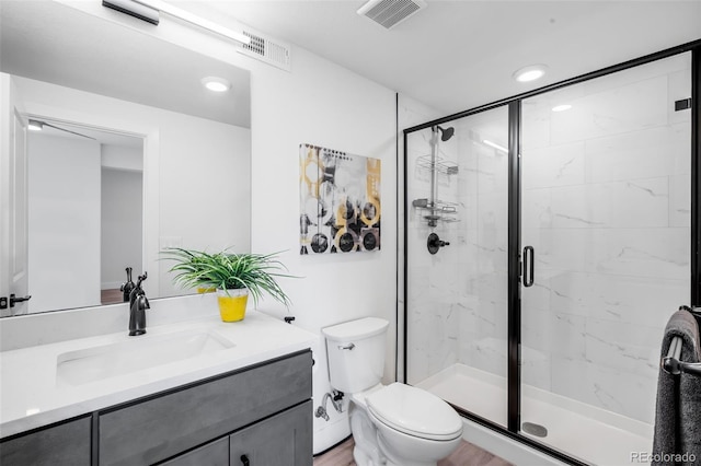 16262 W 95th Ln, Arvada, CO 80007 - bathroom with vanity, a stall shower, and recessed lighting