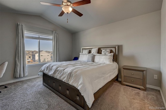 carpeted bedroom with lofted ceiling and ceiling fan