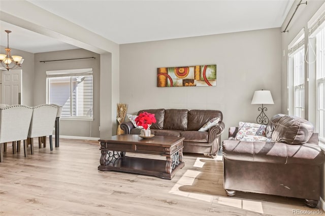 15021 Josephine St, Thornton, CO 80602 - living area featuring a chandelier and wood finished floors