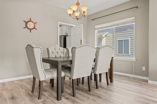 15021 Josephine St, Thornton, CO 80602 - dining room with a chandelier and light wood finished floors