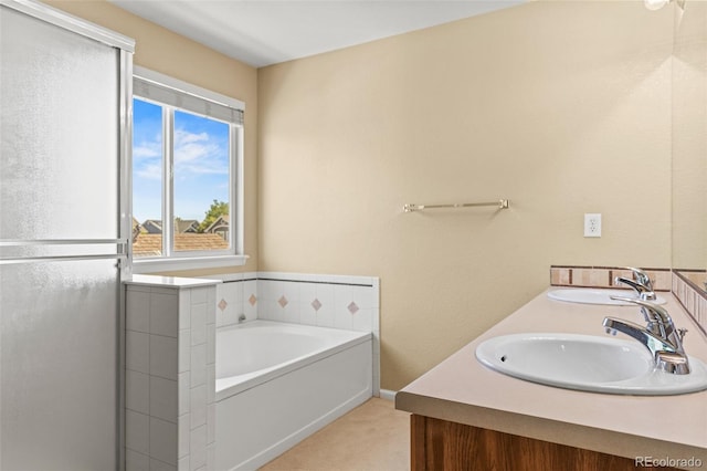 15021 Josephine St, Thornton, CO 80602 - bathroom featuring a bath and double vanity