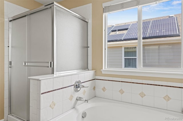 15021 Josephine St, Thornton, CO 80602 - bathroom featuring a stall shower and a bath